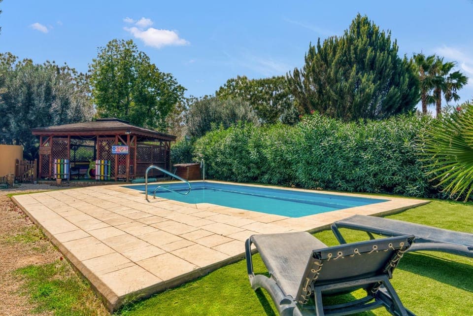 Property building, Living room, Swimming pool