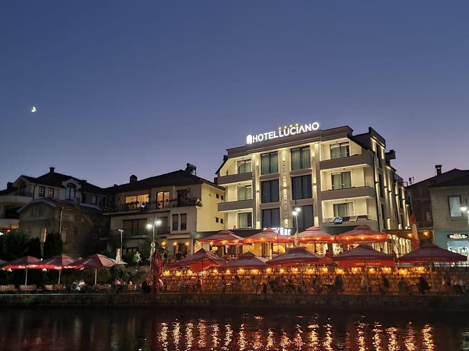 Property building, Nearby landmark, Restaurant/places to eat, Night, Natural landscape, River view