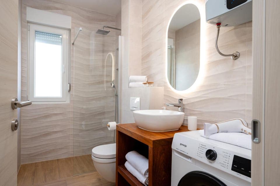 Shower, Toilet, Bathroom, Bath, towels, washing machine, dryer