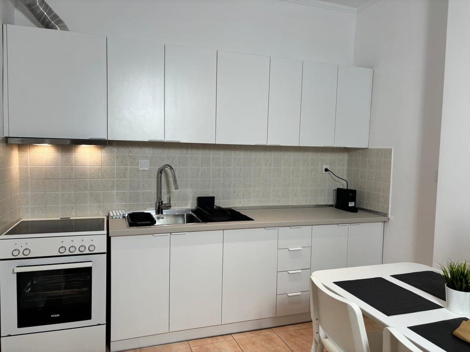 Kitchen or kitchenette, stove