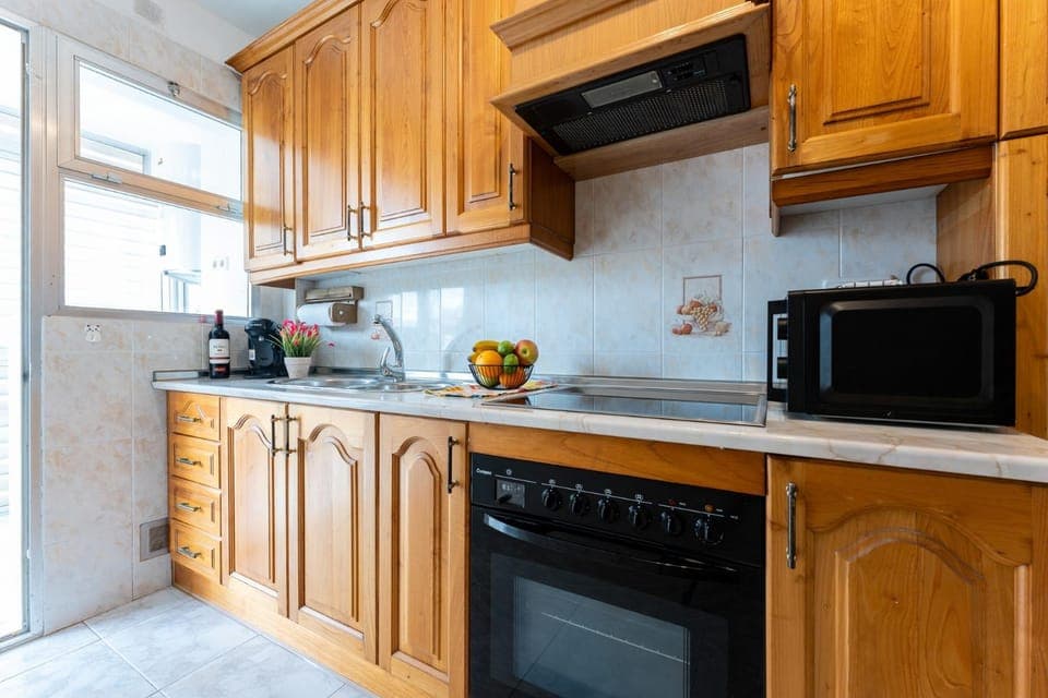 Kitchen or kitchenette, oven, stove