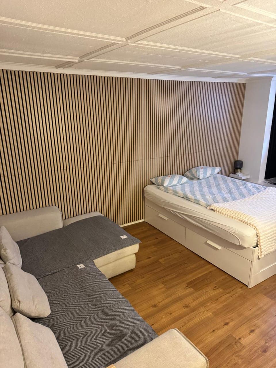 Bed, Living room, Seating area, Bedroom