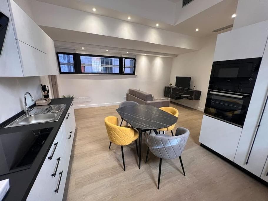 TV and multimedia, Kitchen or kitchenette, Living room, Seating area, Dining area, dishwasher, oven, stove