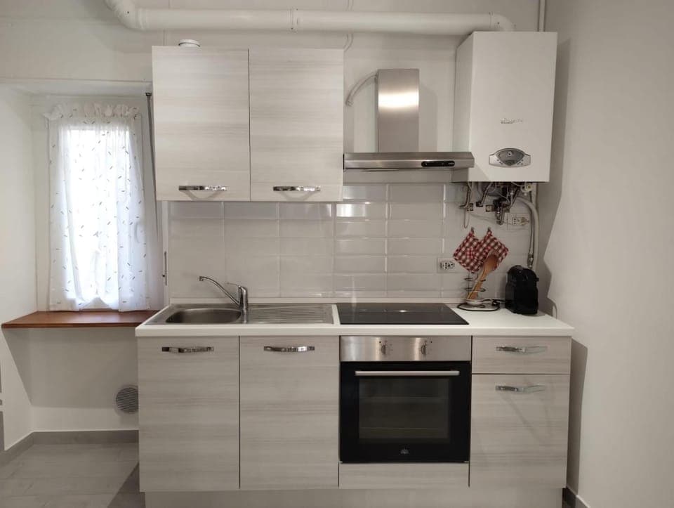 Kitchen or kitchenette, stove