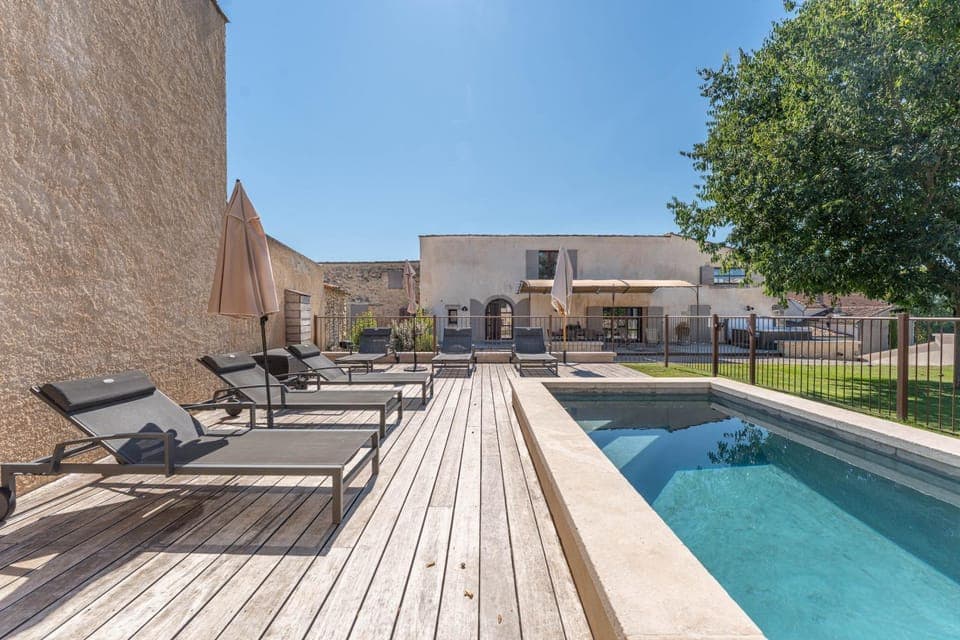 Property building, Day, Natural landscape, Pool view, Swimming pool, sunbed