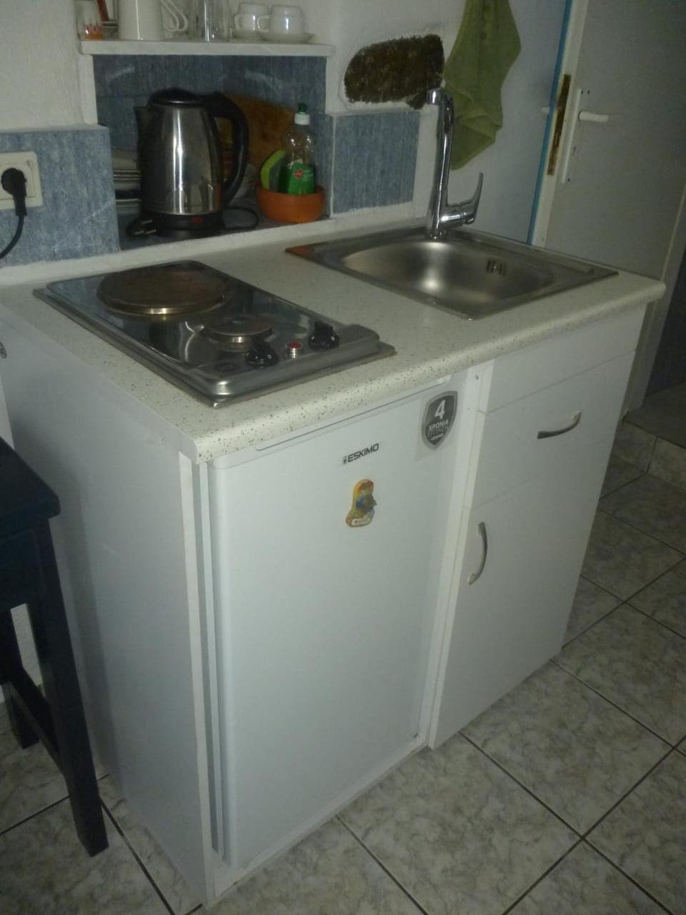 Kitchen or kitchenette, stove