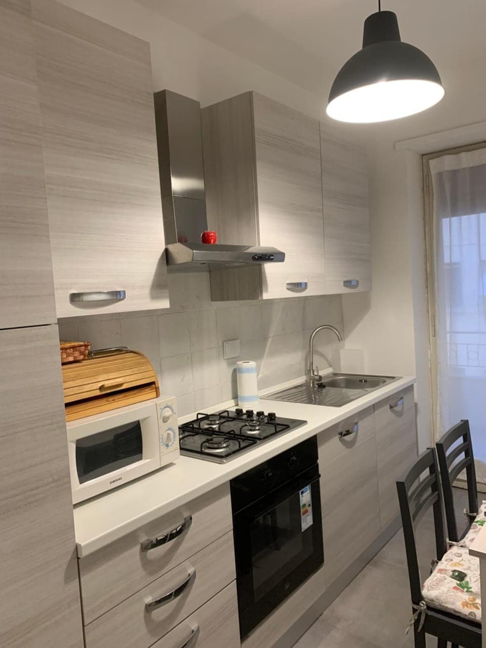 Kitchen or kitchenette, Dining area, dishwasher, microwave, oven, stove