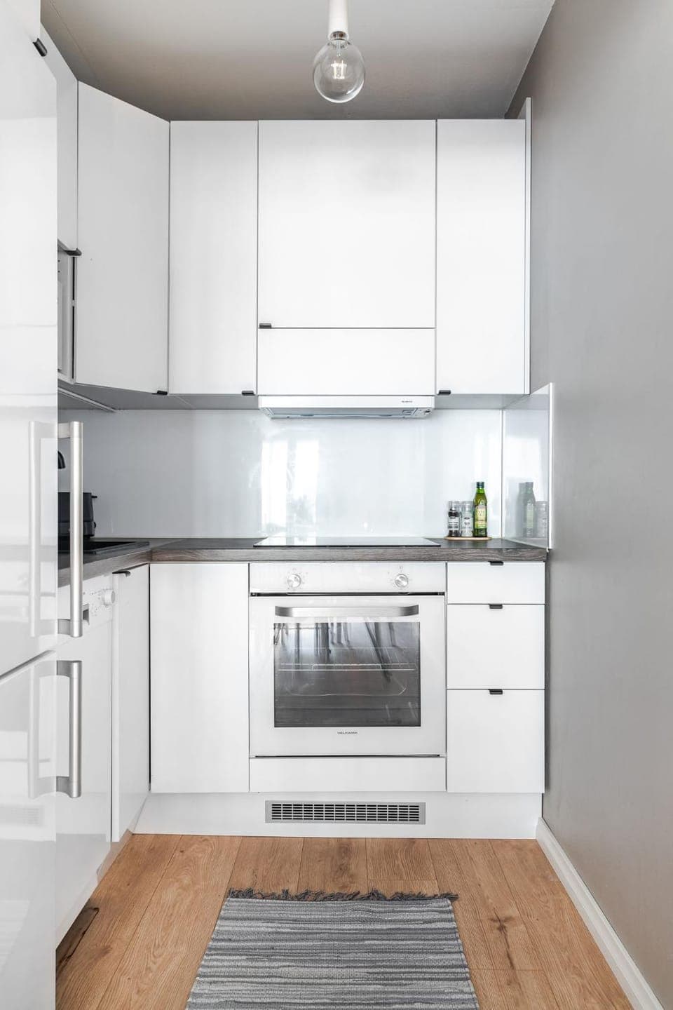 Kitchen or kitchenette, dishwasher, oven, stove