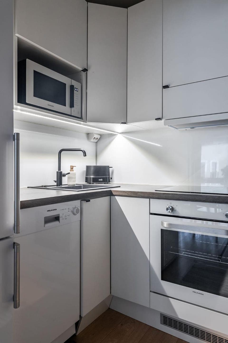 Kitchen or kitchenette, oven, toaster