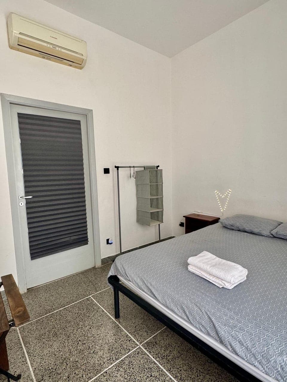 Bed, Photo of the whole room, Bedroom, towels, air conditioner