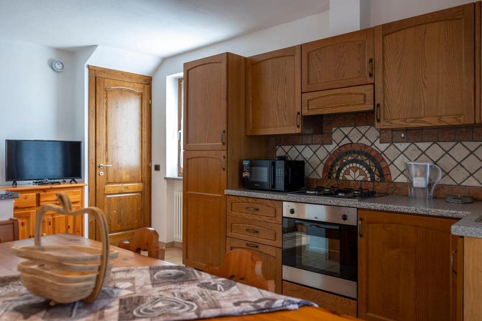 Kitchen or kitchenette, oven, stove