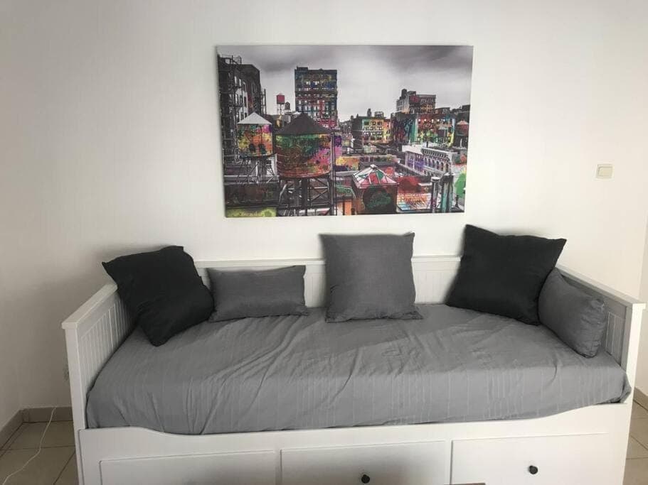 Bed, Living room, Seating area