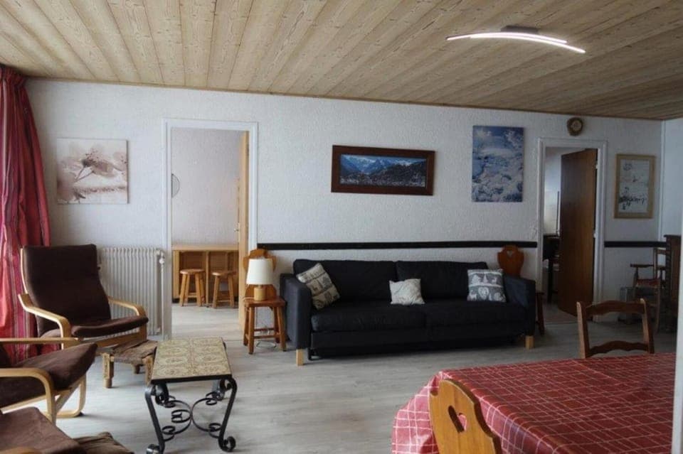 Bed, fireplace, kitchen