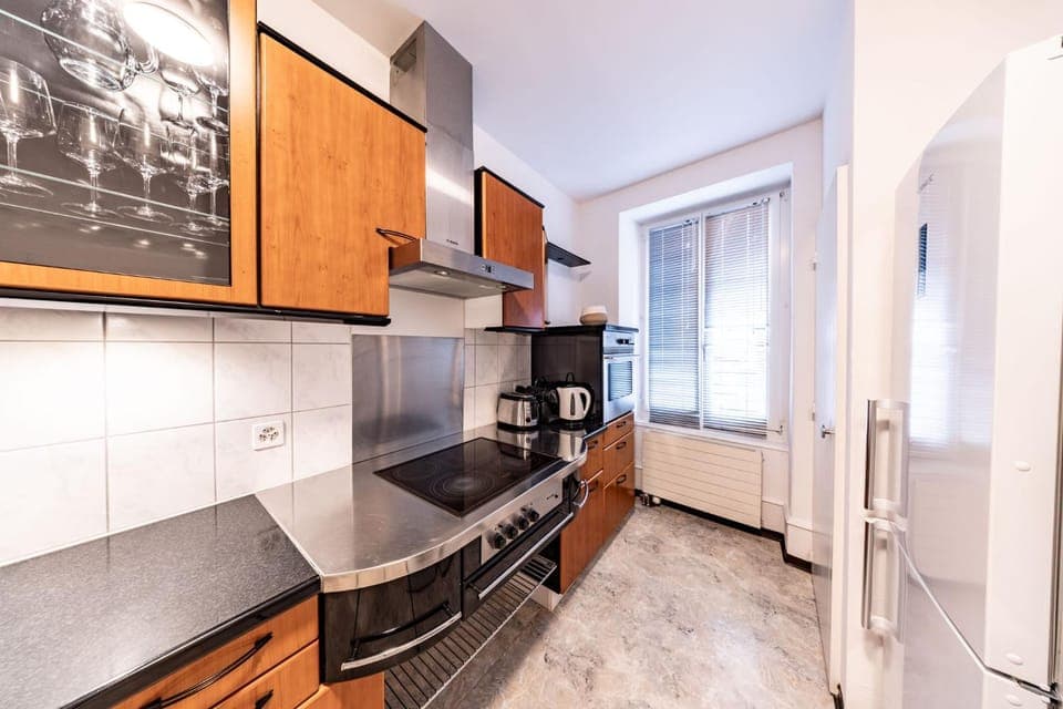 Kitchen or kitchenette, internet, oven, stove, toaster