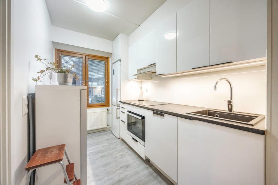 Kitchen or kitchenette, dishwasher, oven, stove