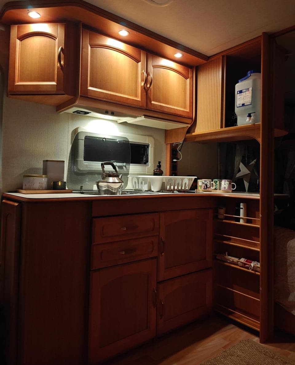 Kitchen or kitchenette, stove