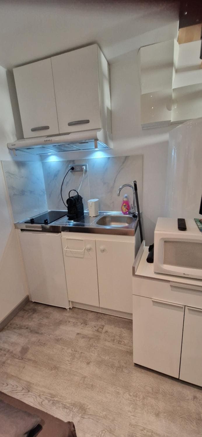 Kitchen or kitchenette, stove