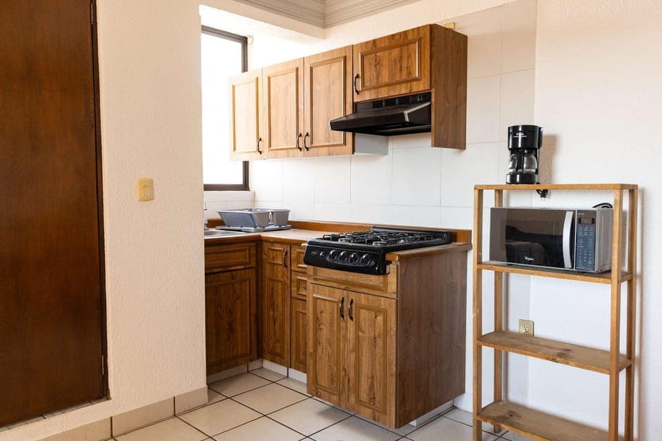 Kitchen or kitchenette, stove