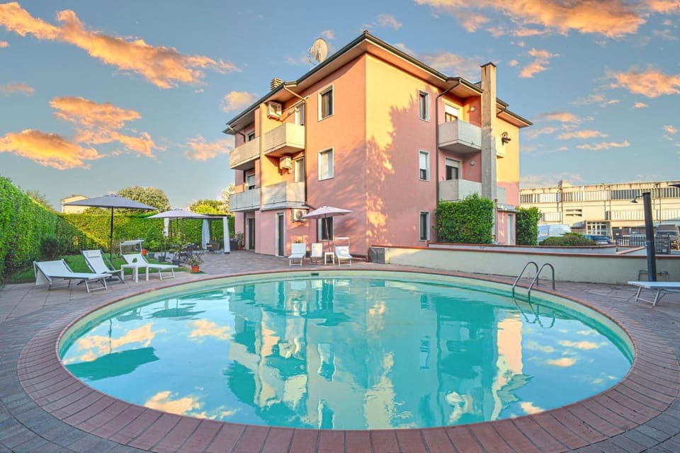 Property building, Day, Natural landscape, Pool view, Swimming pool, sunbed