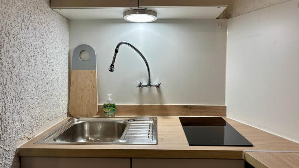 Kitchen or kitchenette, stove