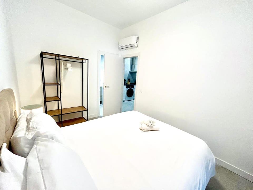 Bed, Photo of the whole room, Bedroom, towels, air conditioner