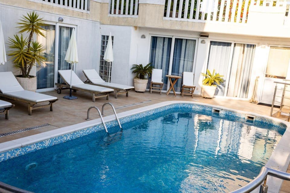 Property building, Pool view, Swimming pool, sunbed