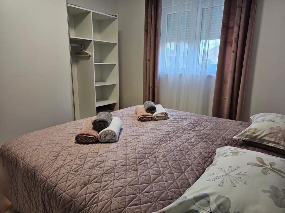 Bed, flat iron, heating, towels, wardrobe