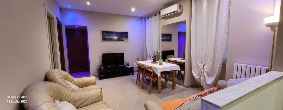 Communal lounge/ TV room, Living room, Seating area, air conditioner
