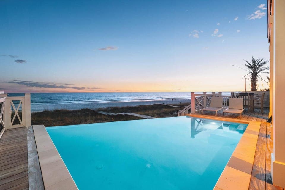 Patio, View (from property/room), Seating area, Beach, Sea view, Swimming pool