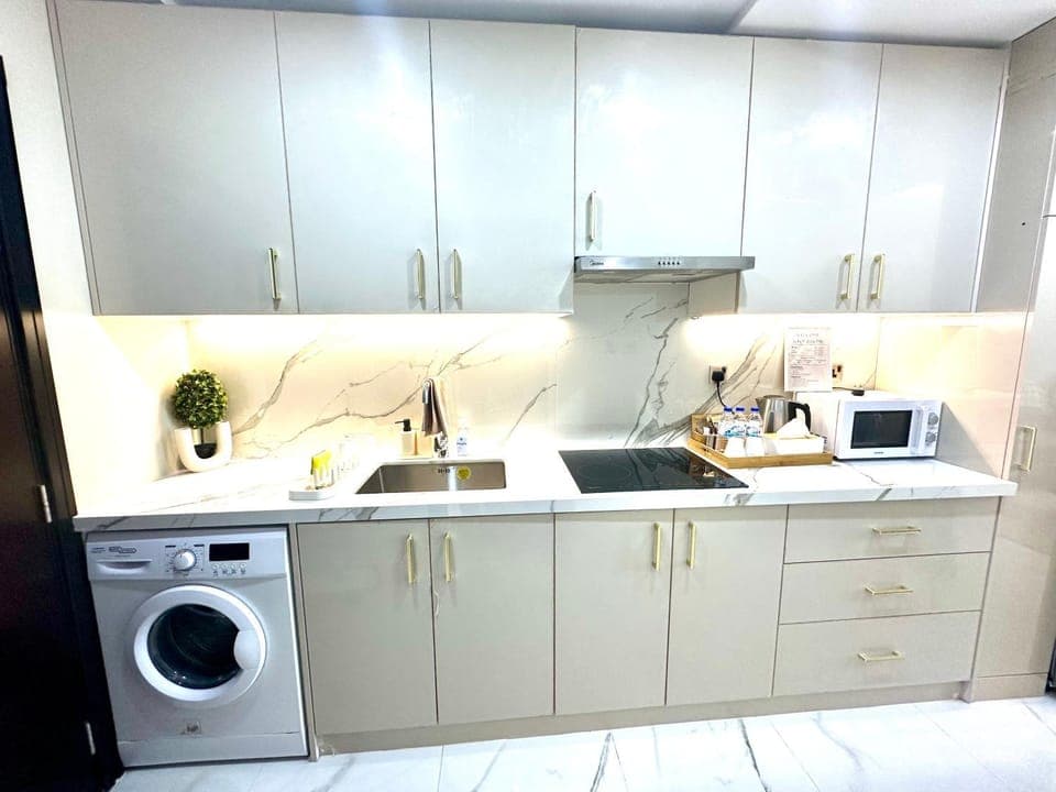 Kitchen or kitchenette, washing machine