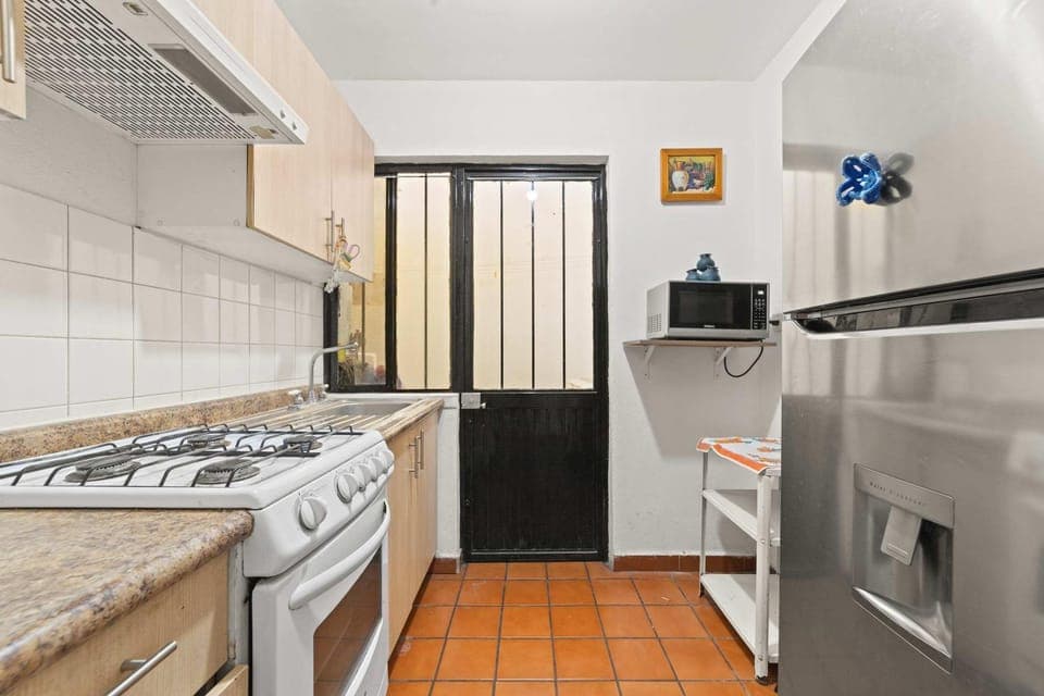 Kitchen or kitchenette, stove