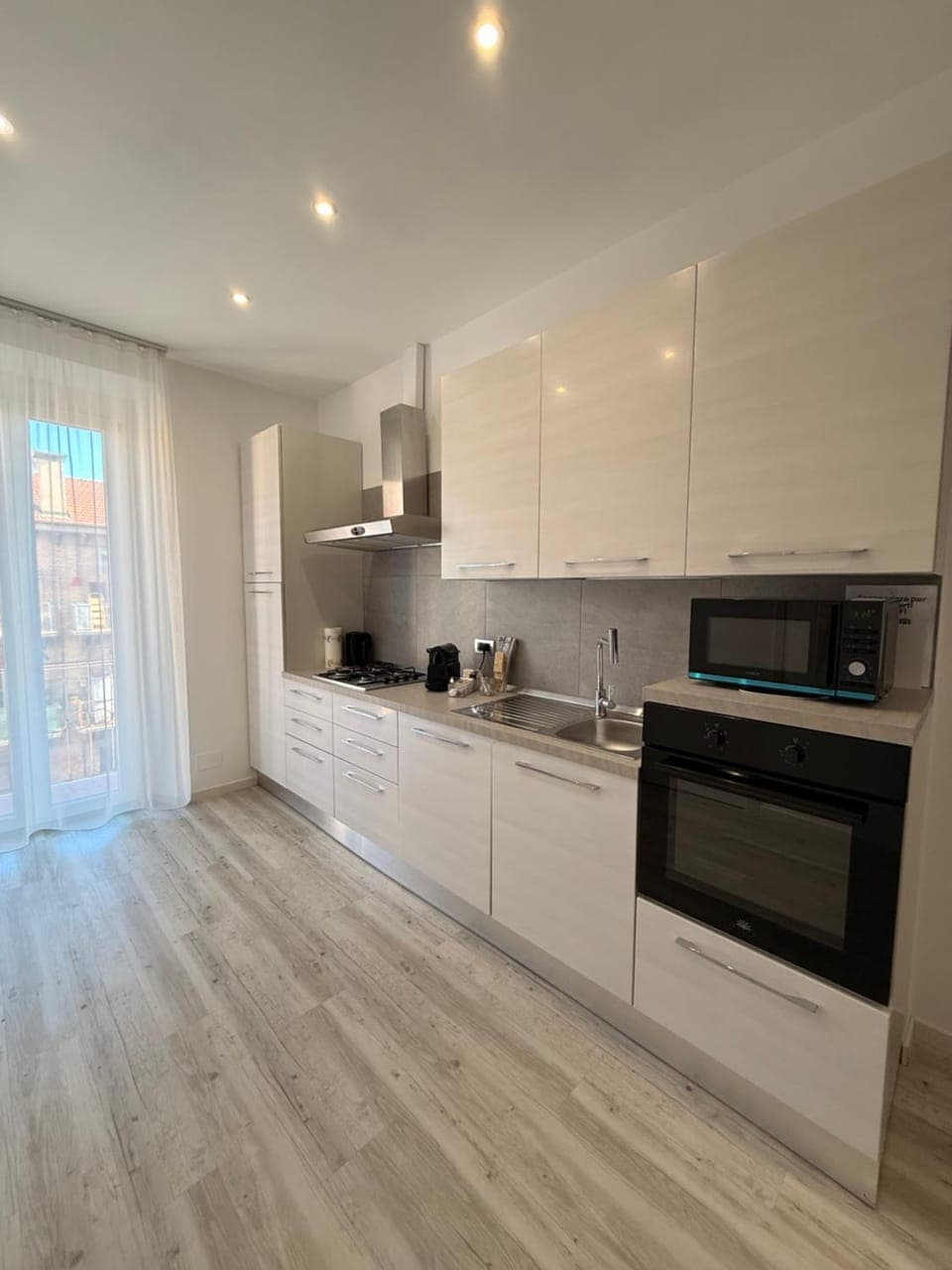 Kitchen or kitchenette, dishwasher, stove, kitchen