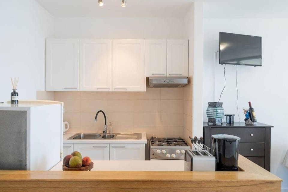 Kitchen or kitchenette, oven, stove, toaster