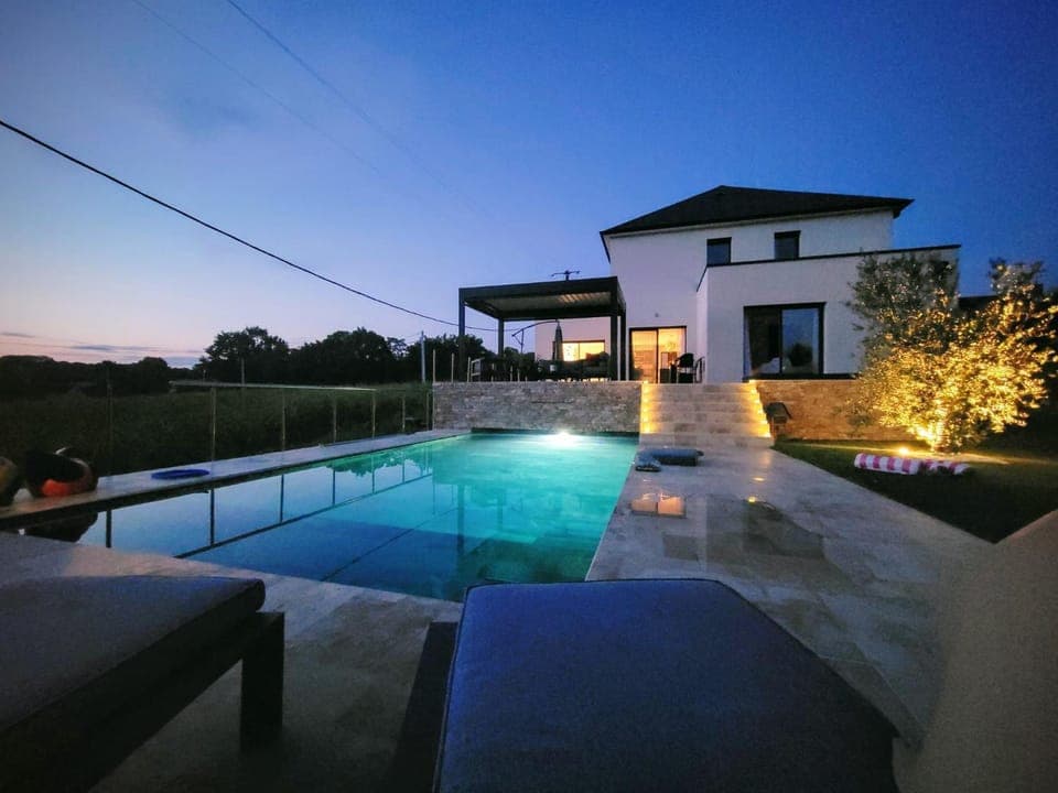 Property building, Patio, Night, Pool view, Swimming pool, Swimming pool, sunbed