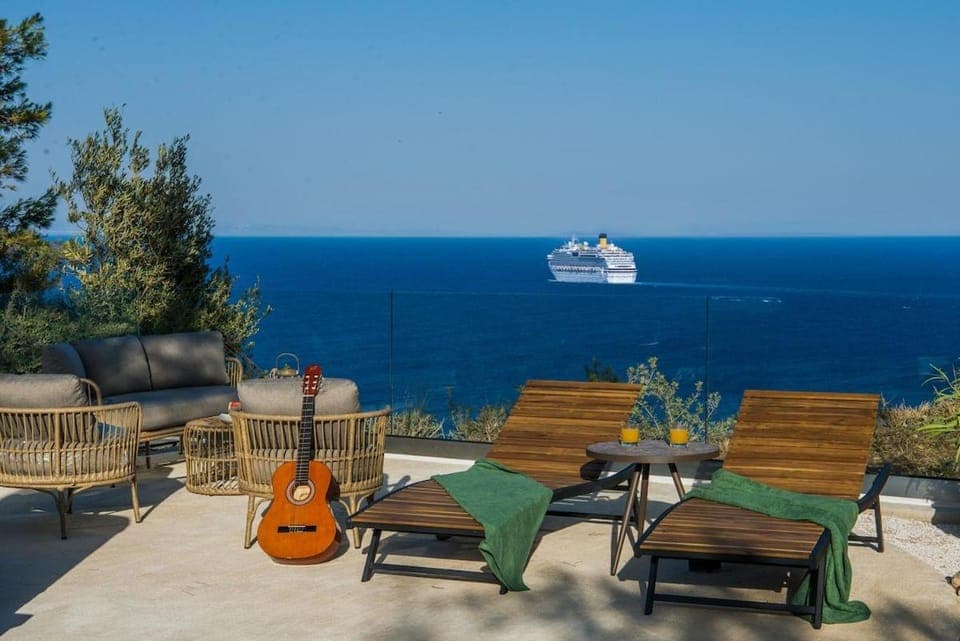 Natural landscape, View (from property/room), Seating area, Sea view, sunbed