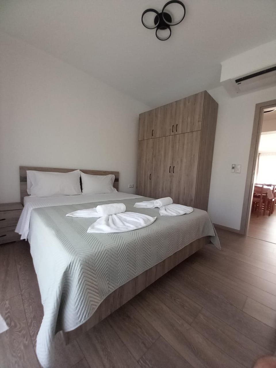 Bed, Bedroom, towels, wardrobe, air conditioner