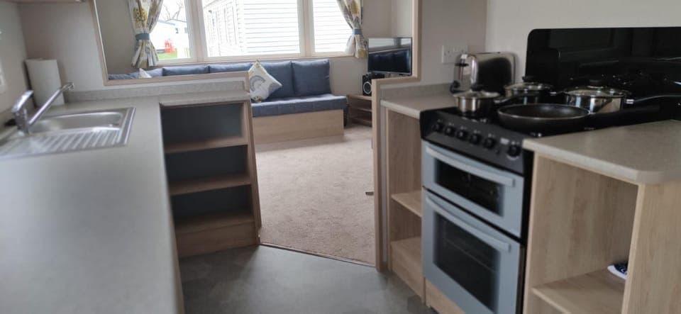 Kitchen or kitchenette, oven, stove, toaster