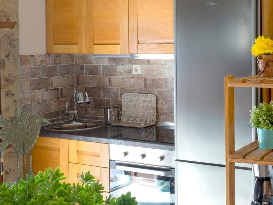 Kitchen or kitchenette, stove