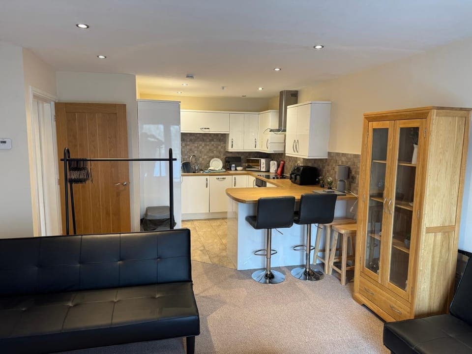 Kitchen or kitchenette, Living room, Seating area, Dining area