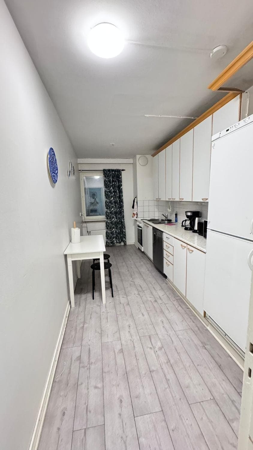 Kitchen or kitchenette, dishwasher, oven, stove