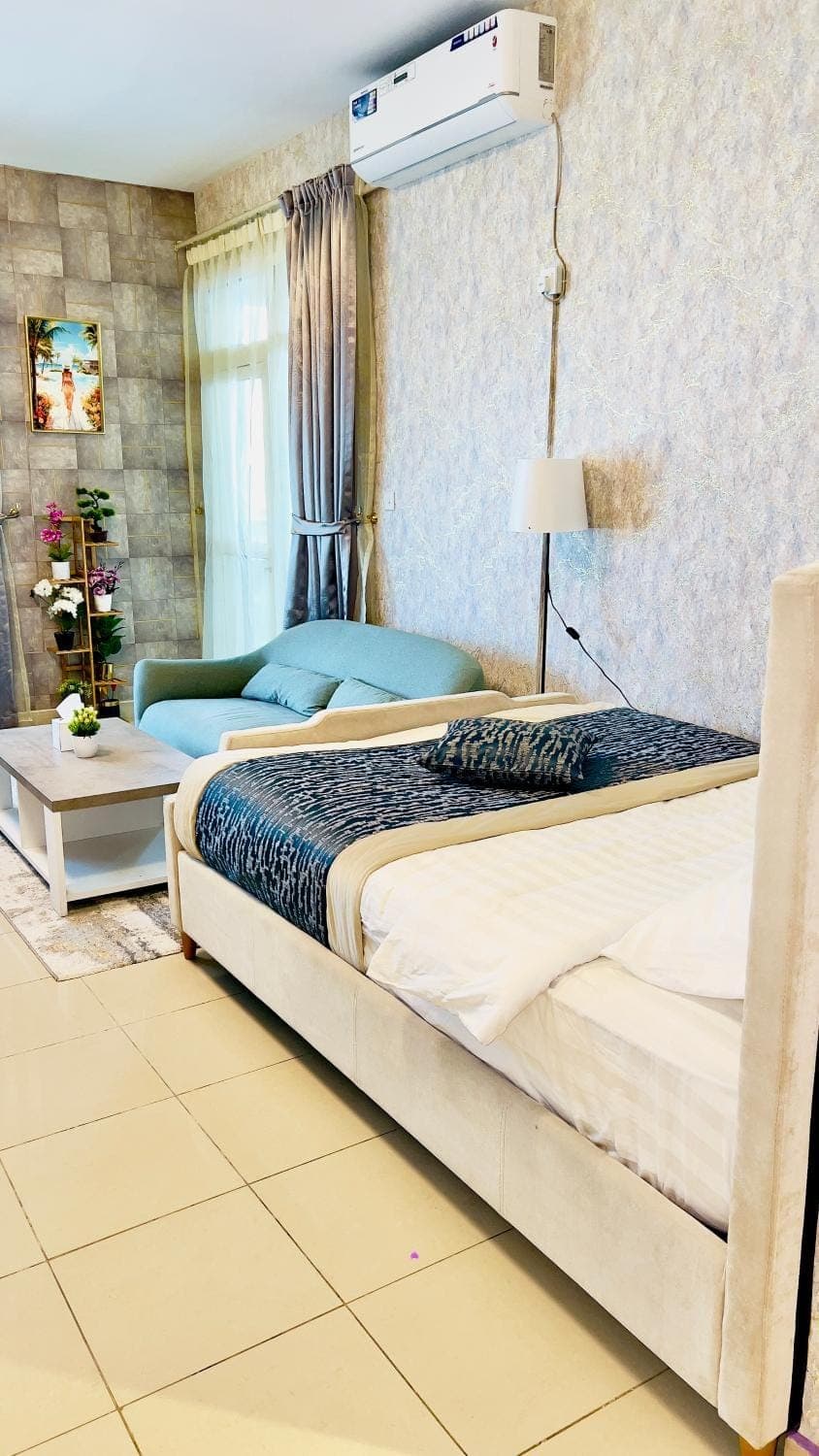 Bed, Living room, Seating area