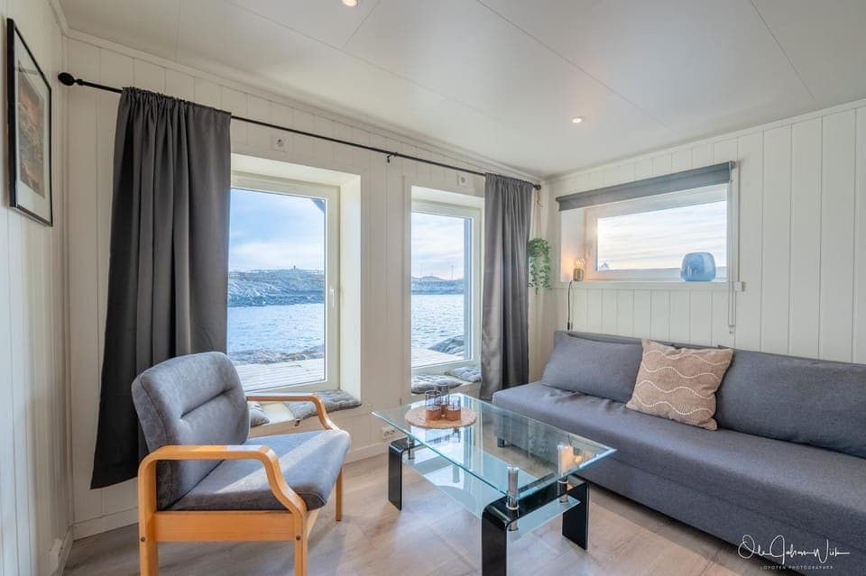 View (from property/room), Living room, Seating area, Sea view