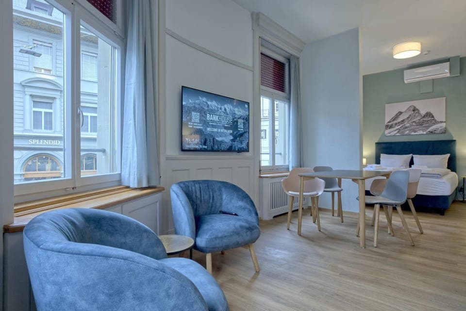 Bed, TV and multimedia, Living room, Seating area, Dining area