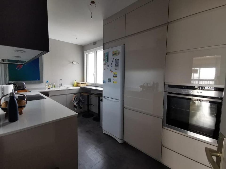 Kitchen or kitchenette, dishwasher, oven, stove, washing machine