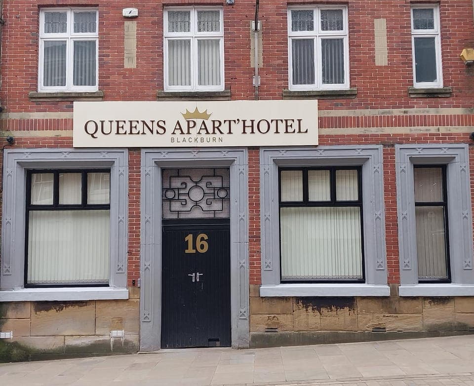 Property building, Facade/entrance, Day, Property logo or sign