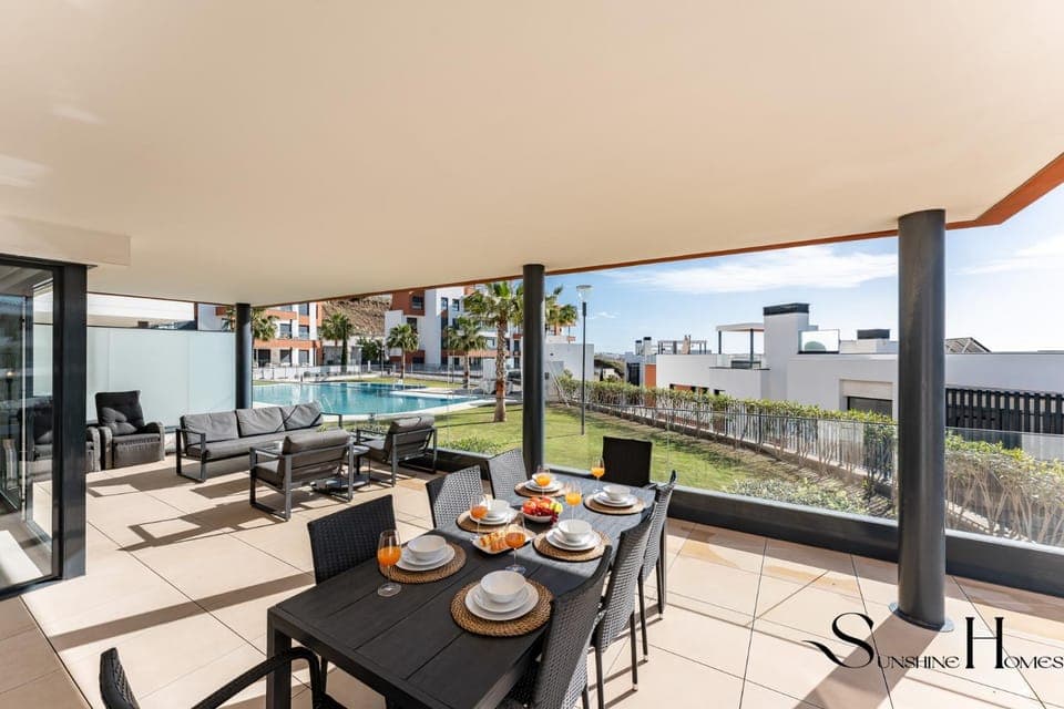 View (from property/room), Balcony/Terrace, Seating area, Dining area, Pool view