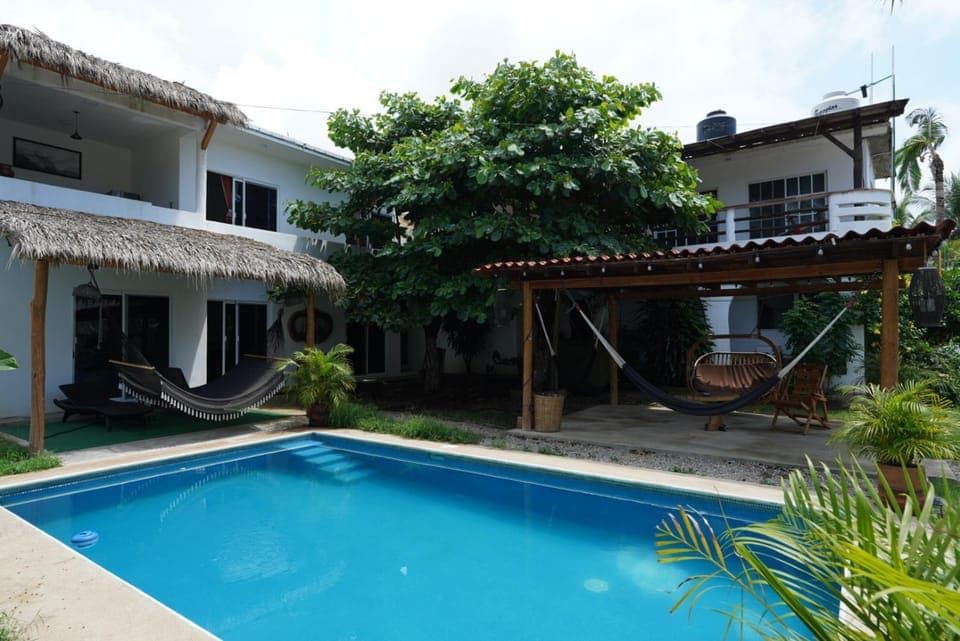 Property building, Patio, Day, Garden, Garden view, Pool view, Swimming pool, sunbed