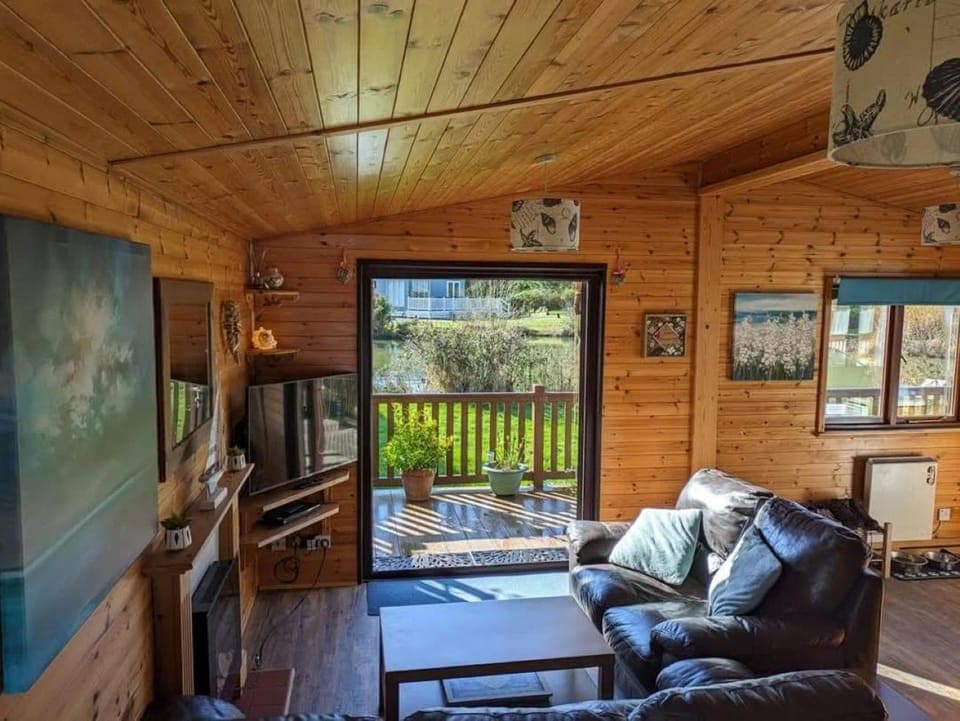 Living room, Seating area, Garden view, Lake view