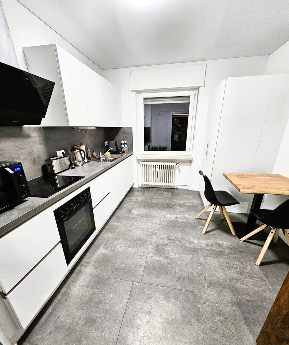 Kitchen or kitchenette, dishwasher, oven, stove, toaster