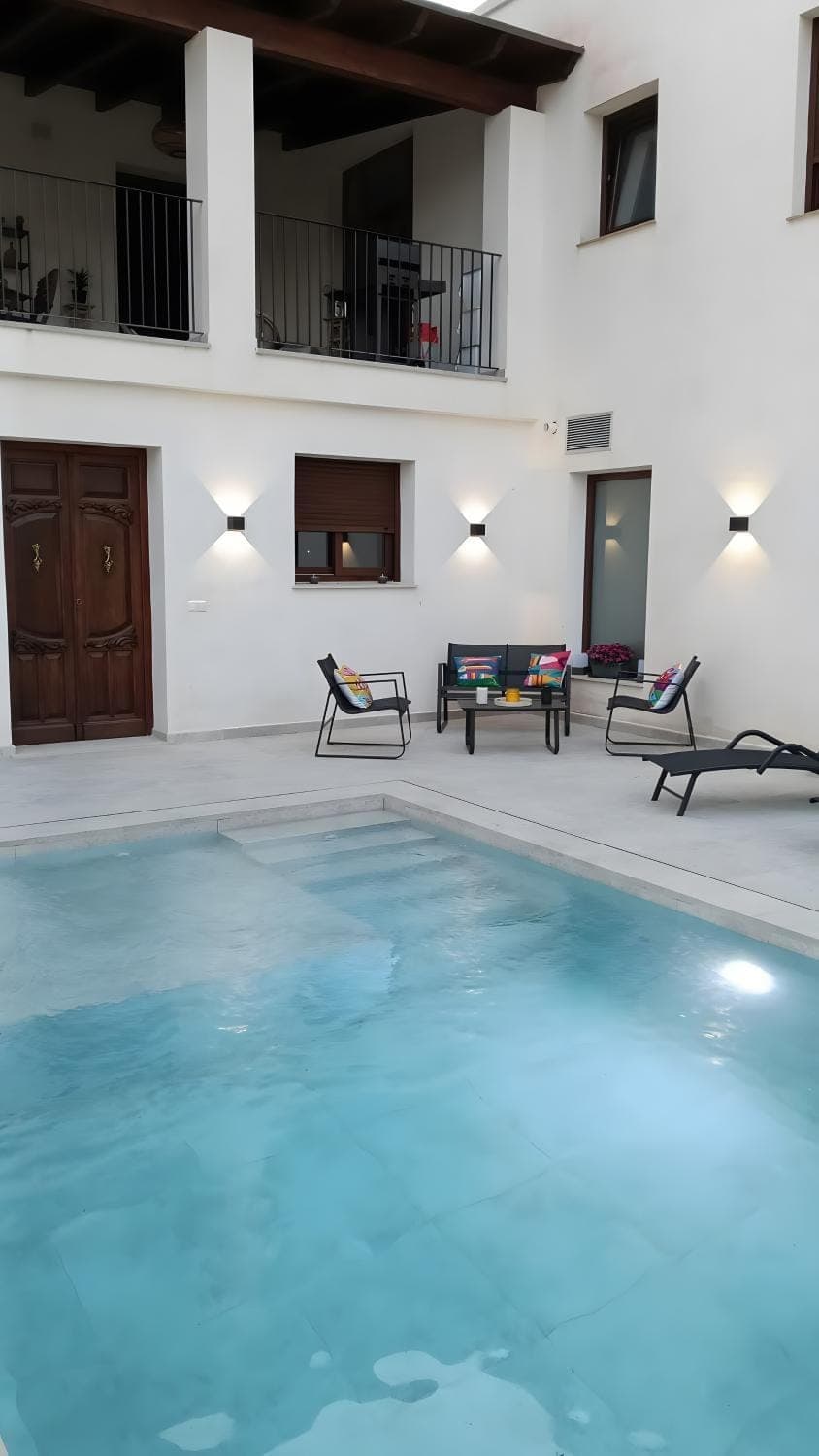 Property building, Living room, Swimming pool